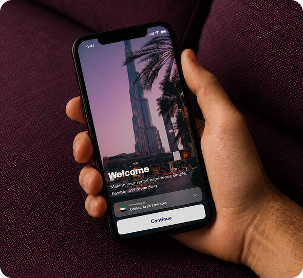 The Rently app's welcome screen shown on a phone